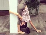 This one looks painful! Hilaria Baldwin performs splits while leaning on beam of her posh Hamptons house in another effort to shock followers