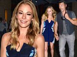 Caught in some drizzle: LeAnn Rimes and Eddie Cibrian dashed through the rain to a screening party of their new reality show LeAnn & Eddie in New York City on Tuesday