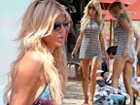 Summer sun! Victoria Silvstedt relaxes in between work while in Mykonos, Greece.