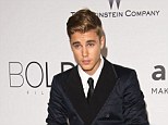 Another delay: Justin Bieber's DUI case has been postponed until August 5 as attorneys work out plea deal, pictured in at Cannes Film Festival in May