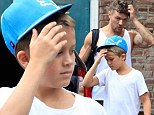 It's tough being a mini me! Ryan Phillippe's son Deacon is his dad's mirror image after they have a family workout session