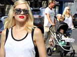 Gwen Stefani works tomboy chic as she joins husband Gavin Rossdale and their sons for family day out in London