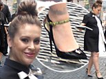 Pregnant Alyssa Milano shows off her huge bump in black dress and stiletto heels after ringing the closing bell on Wall Street
