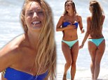 Soccer hero Tim Howard's new WAG Nora Segura shows off her bikini body while frolicking in the ocean in Malibu