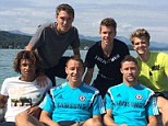 Team picture: John Terry takes a boat trip with the likes of Gary Cahill and Marco van Ginkel