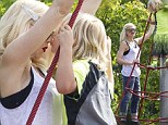 Gwen Stefani enjoys some family time in a London park with husband Gavin Rossdale and three sons, Kingston, Zuma and Apollo