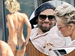 Bikini-clad Pamela Anderson flashes her wedding ring AND pert posterior as she enjoys vacation with husband Rick, weeks after divorce filing