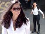 It's a real stretch! Olivia Munn adds a touch of glamour to the Ride Along 2 set... as she keeps her body limber with a fitness session