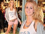 Erin Heatherton and her impressive pins lead a posse of international models at the opening of a clothing store in Brazil
