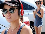 She's working on it! Lucy Hale shows off lean pins in running shorts as she dons athletic gear for fitness regimen