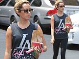 But she's rich and lives in a mansion! Ashley Tisdale tries to look gangster in tank top that represents one of LA's roughest neighborhoods