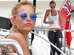 On the yacht: Toni Garrn wore blue mirrored sunglasses on Tuesday while relaxing aboard a yacht with boyfriend Leonardo DiCaprio