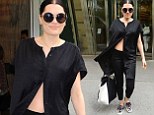 Jessie J parades her toned tum in new York as she steps out in an unbuttoned shirt