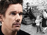 Ethan Hawke plays the guitar while his daughters Clementine, six, and Indiana, three, dance around in a photo feature of Beach magazine's August issue