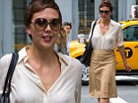 Stylish in the city: Maggie Gyllenhaal looked chic in a loose cream blouse and tan leather-like skirt as she left lunch at Le Pain Quotidien in New York's Soho neighbourhood on Tuesday