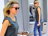 Cashing in! Naomi Watts is svelte in skinny jeans as she collects a hefty wad of bills from an ATM