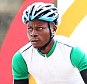 In action: Moses Sesay is pictured during the road race time trial at the Commonwealth Games