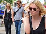 New York is for lovers! Dakota Fanning and boyfriend Jamie Strachan are inseparable while out and about hand-in-hand