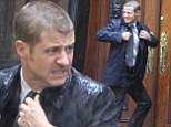 2711600  In need of a cape and cowl! Gotham star Benjamin McKenzie gets soaked as he films Batman prequel in New York