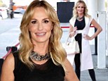 Taylor Armstrong highlights her long legs in skintight metallic trousers with towering pumps as she arrives for TV appearance