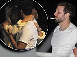 Lights, camera, embrace! Bradley Cooper hugs girlfriend Suki Waterhouse as she visits him on London set of new comedy