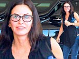 Taking the plunge! Make-up free Courteney Cox flashes cleavage in low-cut top as she arrives to meeting in Beverly Hills