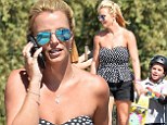 Britney Spears cranks up the heat in polka dot top and tiny black shorts while treating her boys to skateboarding fun