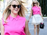 Making Elle Woods proud! Reese Witherspoon displays her slender figure in bright pink top and white skirt