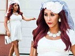 It's not the big day yet! Pregnant and soon-to-be-married Snooki shows off slim pins in a white bridal outfit featuring mini-dress and veil
