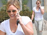 Hilary Duff smiles and chats as she walks to a spa in West Hollywood