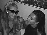 Friends again? Kim posts an Instgram of her and old pal Paris Hilton sharing a laugh