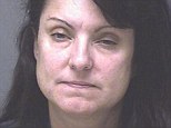 Passed-out: Susan Porfido-Gibson has been charged with child endangerment and drunken driving and is currently in jail on a $50,000 bond