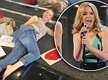 Catching up on some sleep? Bleary eyed Kylie Minogue takes a breather as she rehearses for upcoming Kiss Me Once tour