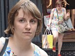 Lena Dunham displays her alabaster legs in a colourful printed mini dress while shopping in New York