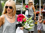 Kimberly Stewart was seen making her way, looking ever so stylish, through the various stands holding the hand of the cutest patron there. Delilah, whose father is actor Benecio del Toro, pointed out all the interesting items for sale while her mom carried the collection of white lilies and pink sunflowers.