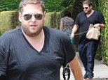 21 plump street! Jonah Hill shows off his new fuller figure as he takes his dog for a walk in Los Angeles