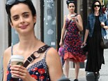 Summer to street chic: Krysten Ritter started her Saturday in a floral frock, left, before donning a black dress, right, in New York City