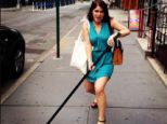 Hockey fan: History of Art graduate Princess Eugenie, 24, posed with the stick in the middle of New York
