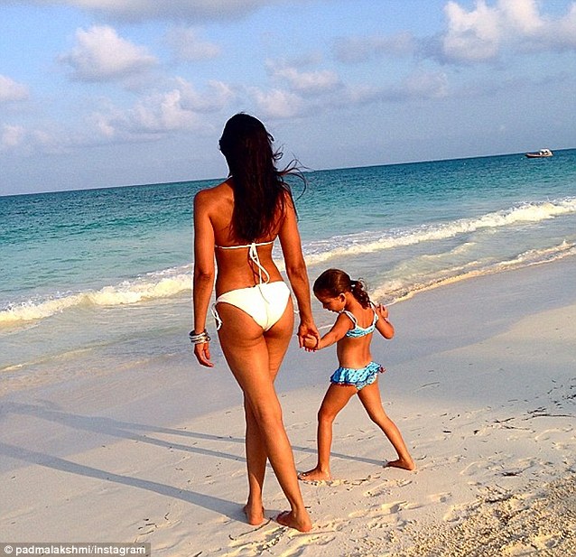 Looking good: Padma Lakshmi flaunted her fabulous bikini body on Thursday while on holiday in Mexico with daughter Krishna