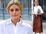 Style icon: Olivia Palermo sported a long vintage leather skirt paired with a crisp white blouse with a rhinestone encrusted collar in New York on Monday