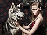 Animal instinct: Dutch supermodel Lara Stone poses with two wolves in a  fashion shoot for Vogue, which was styled by Kate Moss