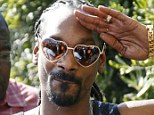 Hippie chic: Snoop Dogg wore heart-shaped glasses in Saint Tropez today