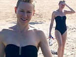 Cor, Watt a body! Naomi, 45, shows off her smoking hot figure in a sexy strapless black one piece as she hits the sands with Liev and children in Mexico