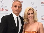 Couple: Sunderland defender Wes Brown's wife Leanne is still counting the pennies - as she proved during a recent trip to Legoland. Above, the couple are pictured at the Grosvenor House Hotel in London in May