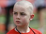 An eight-year-old boy, who became an internet sensation after millions viewed a video of his touchdown run at a football game, has been told his cancer has returned.