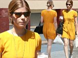 Sunshine: Kate Mara brightened up New York City in a vivid yellow romper as she strolled around on Friday