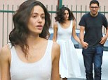 Still going strong: Emmy Rossum holds hands with boyfriend Sam Esmail on Shameless set in rare snap together