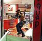 Lashing out: A few thousand people crammed a suburban St. Louis street Sunday night at a vigil for unarmed 18-year-old Michael Brown shot and killed by a police officer, while afterward several car windows were smashed and stores were looted as people carried away armloads of goods as witnessed by an an Associated Press reporter