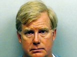 This photo provided Monday, Aug. 11, 2014 by the Fulton County Sheriffís Office, shows U.S. District Court Judge Mark Fuller after his arrest on a misdemeanor battery charge in Atlanta.