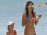 Ice, ice baby! Supermodel Alessandra Ambrosio and her daughter Anja, 5, wear matching bikiinis while on the beach in Hawaii on Monday
